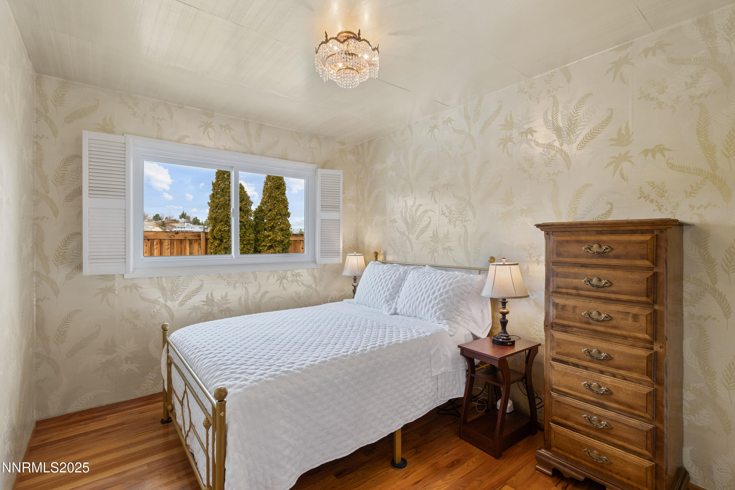 1885 Solari Drive Reno, NV 89509 - Photo 26 of 52 a bedroom with a bed and a dresser