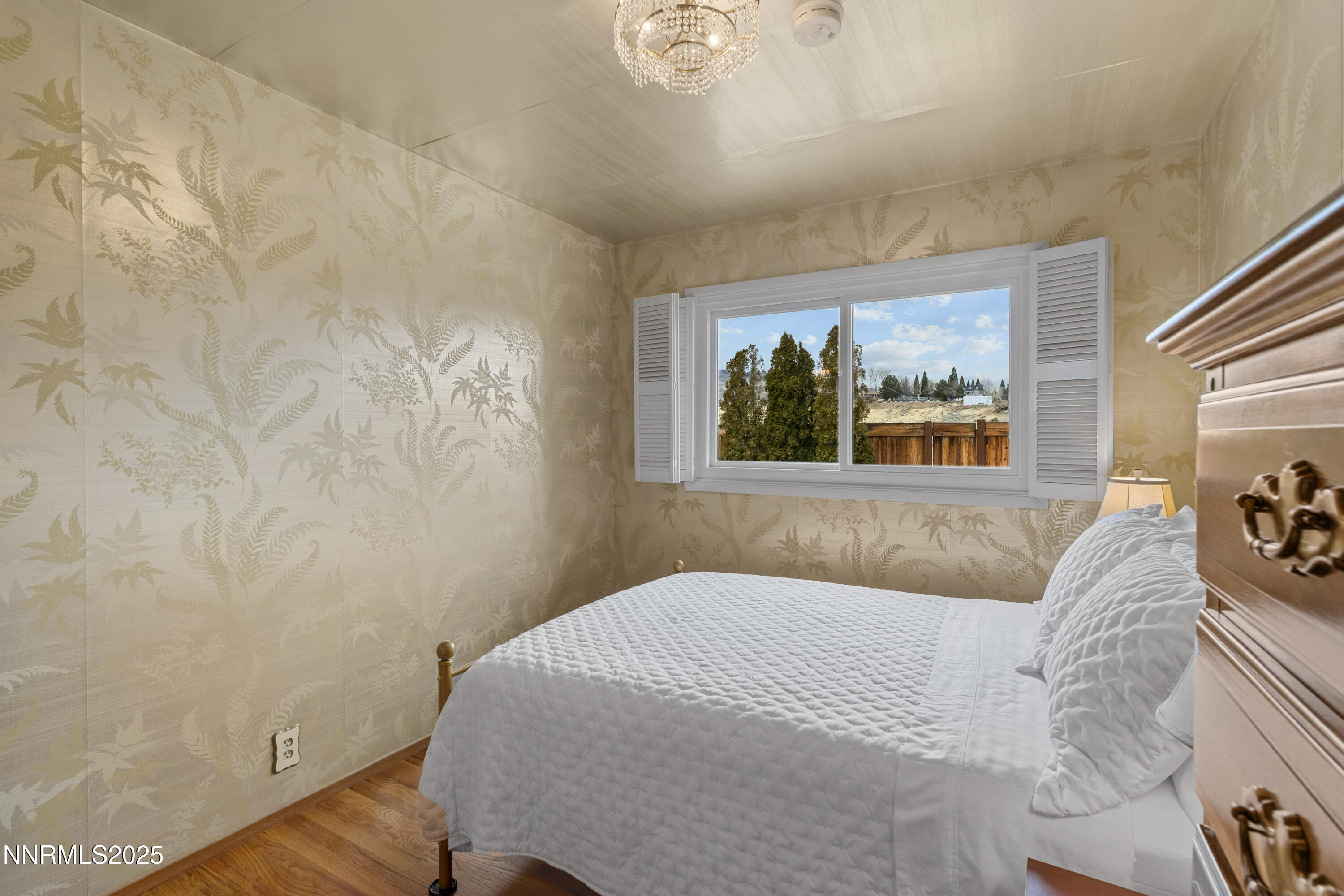 1885 Solari Drive Reno, NV 89509 - Photo 27 of 52 a bedroom with a bed and furniture