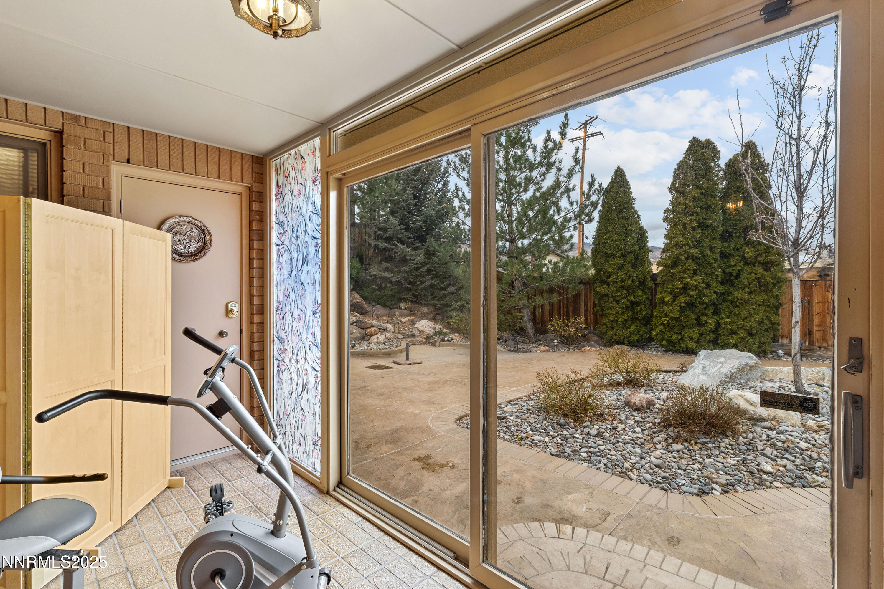 1885 Solari Drive Reno, NV 89509 - Photo 30 of 52 a bathroom with a granite countertop sink and a shower