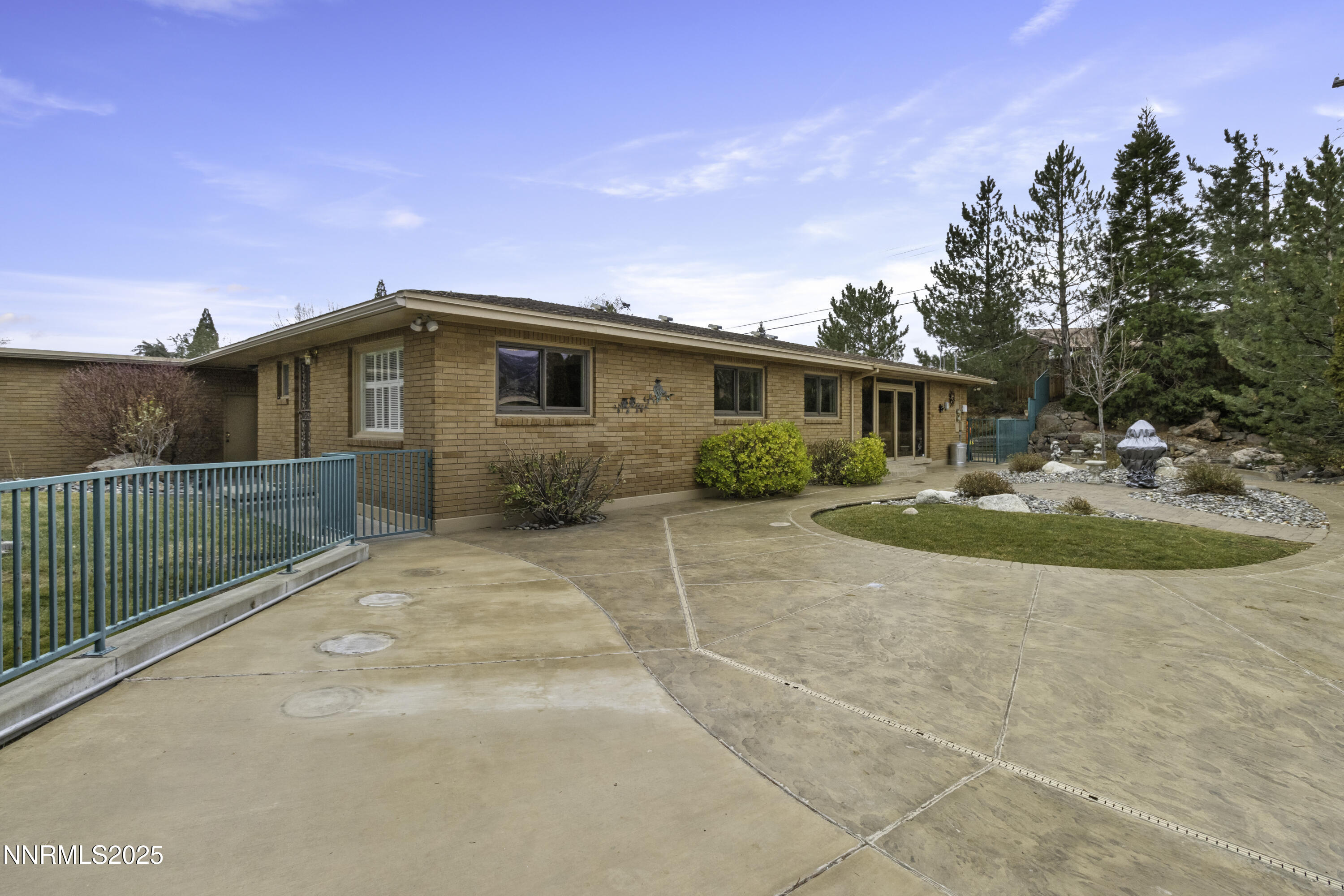 1885 Solari Drive Reno, NV 89509 - Photo 31 of 52 a front view of a house with a yard
