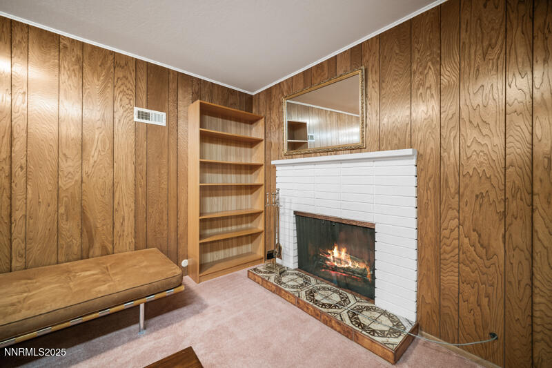 1885 Solari Drive Reno, NV 89509 - Photo 48 of 52 a living room with furniture and a fireplace