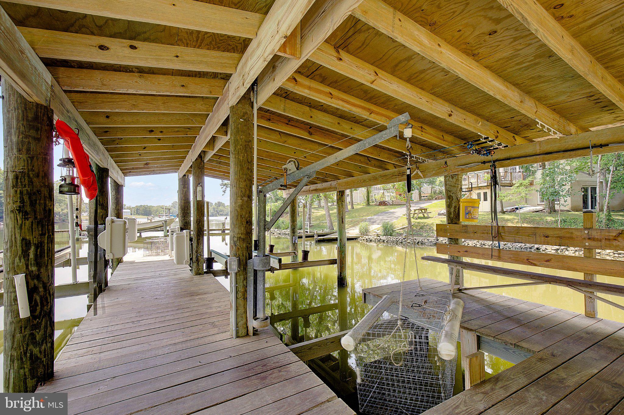 980 Apple Lane Solomons, MD 20629 - Photo 73 of 82 Charming lakeside dock retreat.