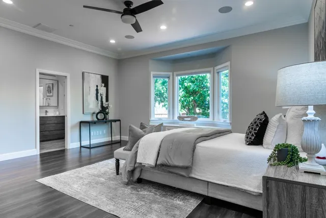 a bedroom with a bed and a couch