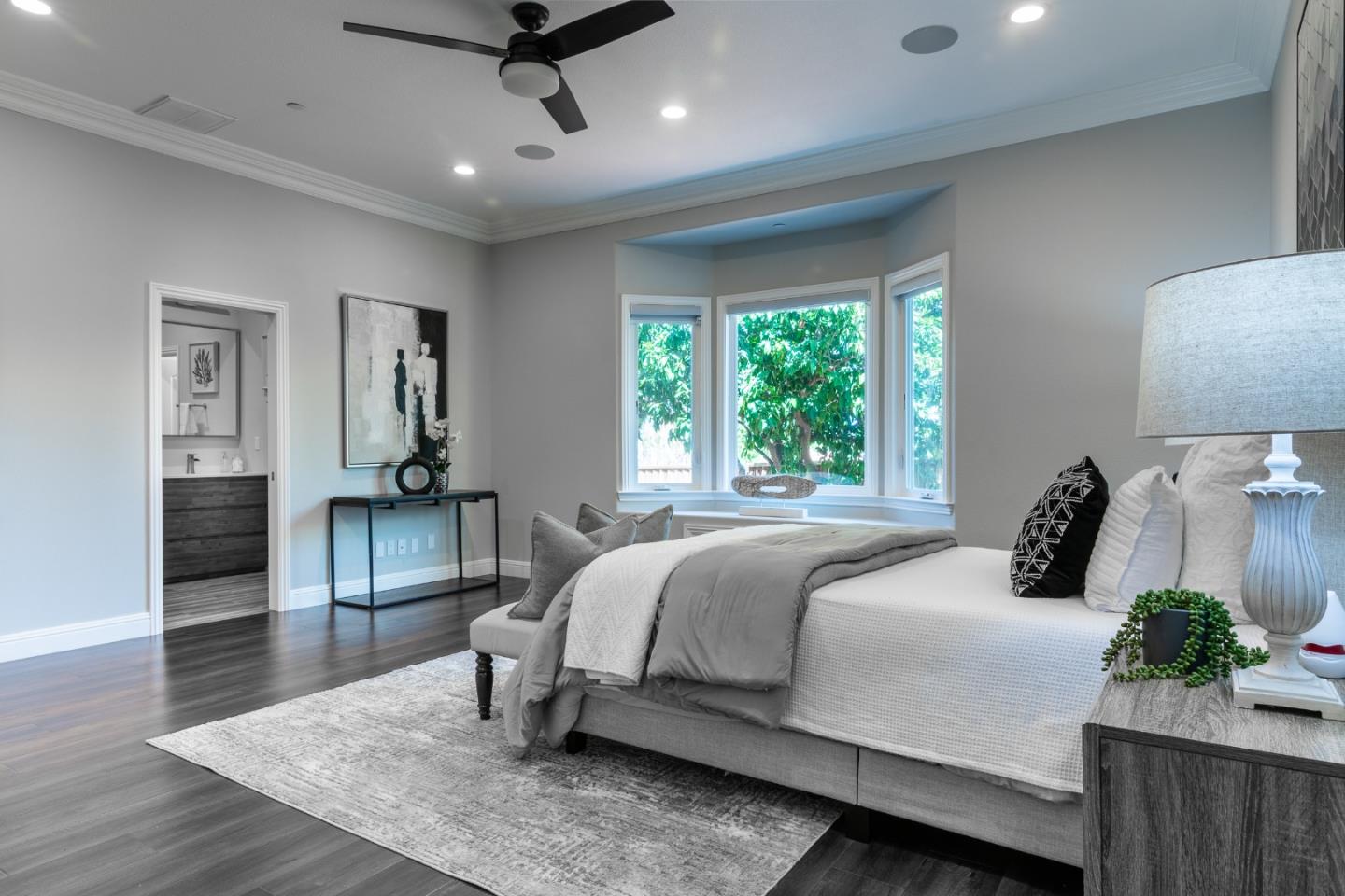 1258 South Stelling Road Cupertino, CA 95014 - Photo 23 of 56 a bedroom with a bed and wooden floor