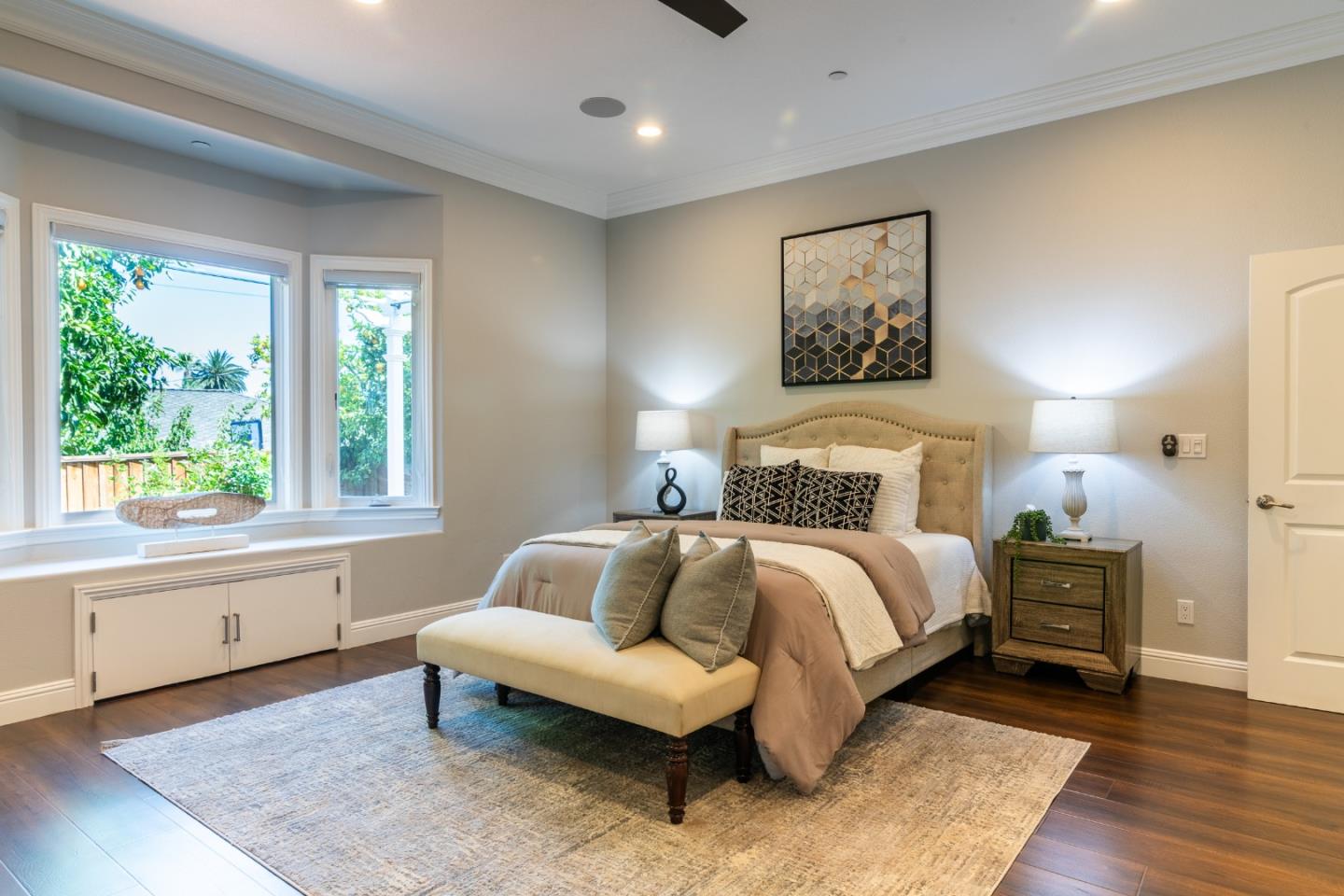 1258 South Stelling Road Cupertino, CA 95014 - Photo 24 of 56 a spacious bedroom with a bed and a large window