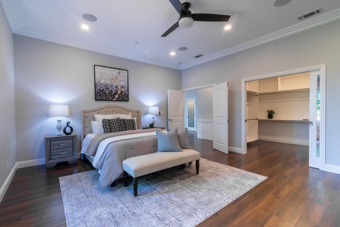 1258 South Stelling Road Cupertino, CA 95014 - Photo 25 of 56 a bedroom with a bed and a couch