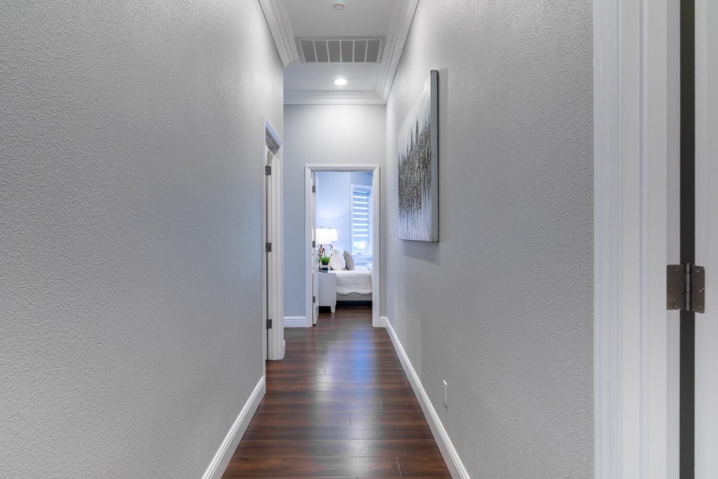 1258 South Stelling Road Cupertino, CA 95014 - Photo 28 of 56 a view of a hallway with wooden floor