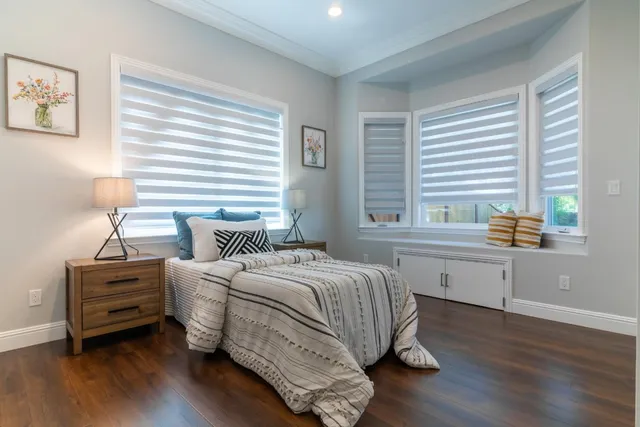 a view of a patio with furniture and a yard