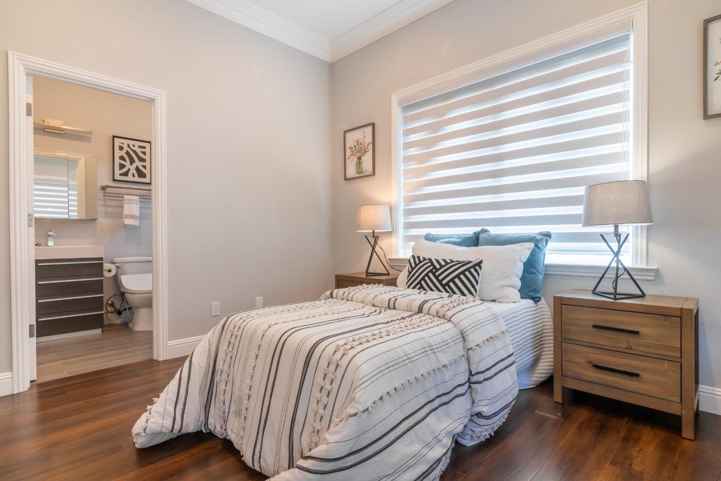 1258 South Stelling Road Cupertino, CA 95014 - Photo 33 of 56 a bedroom with a bed and wooden floor