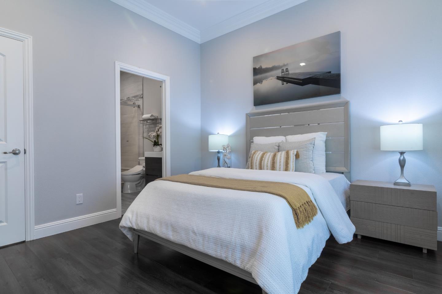 1258 South Stelling Road Cupertino, CA 95014 - Photo 34 of 56 a bedroom with a bed and a lamp