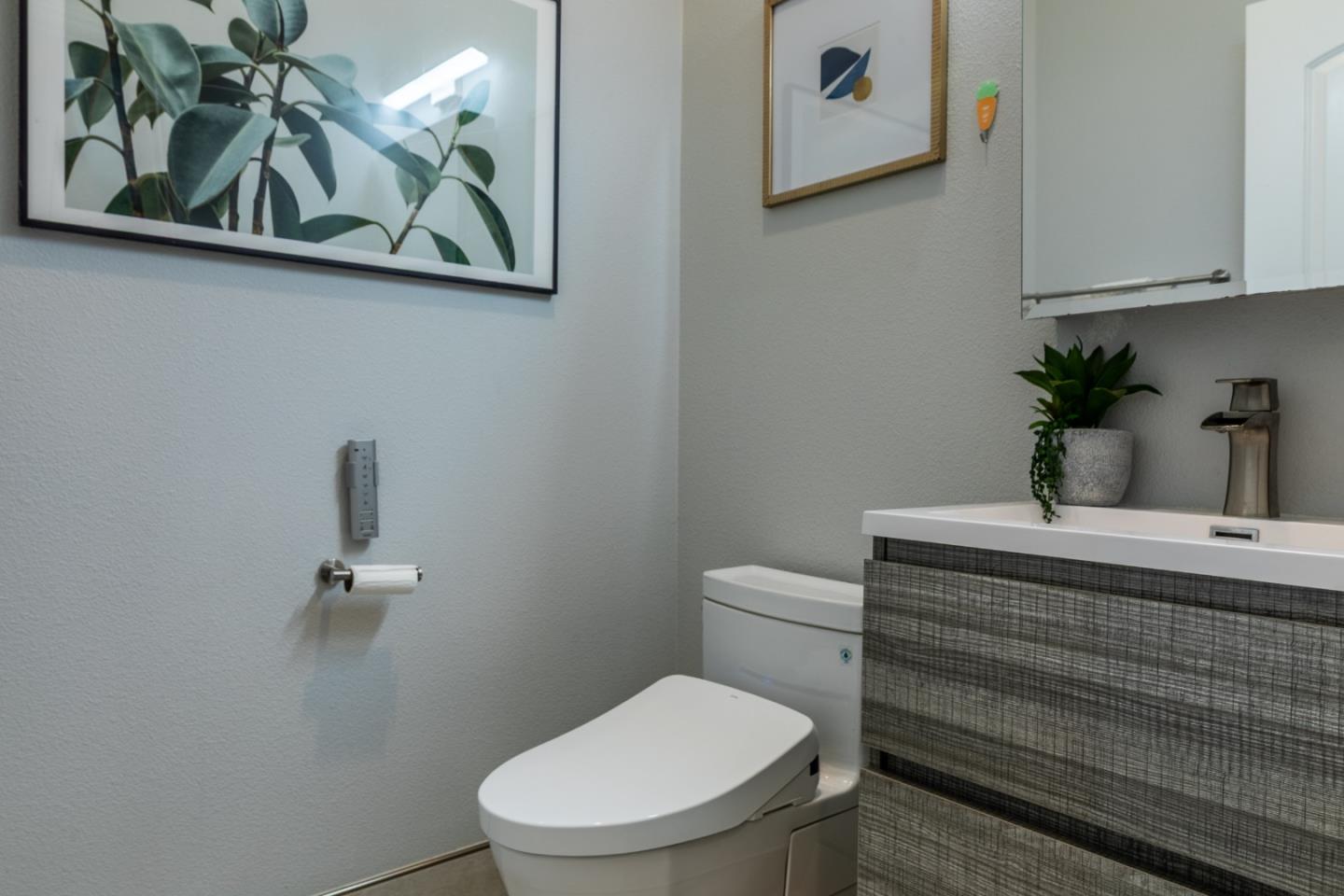 1258 South Stelling Road Cupertino, CA 95014 - Photo 44 of 56 a bathroom with a toilet and a sink