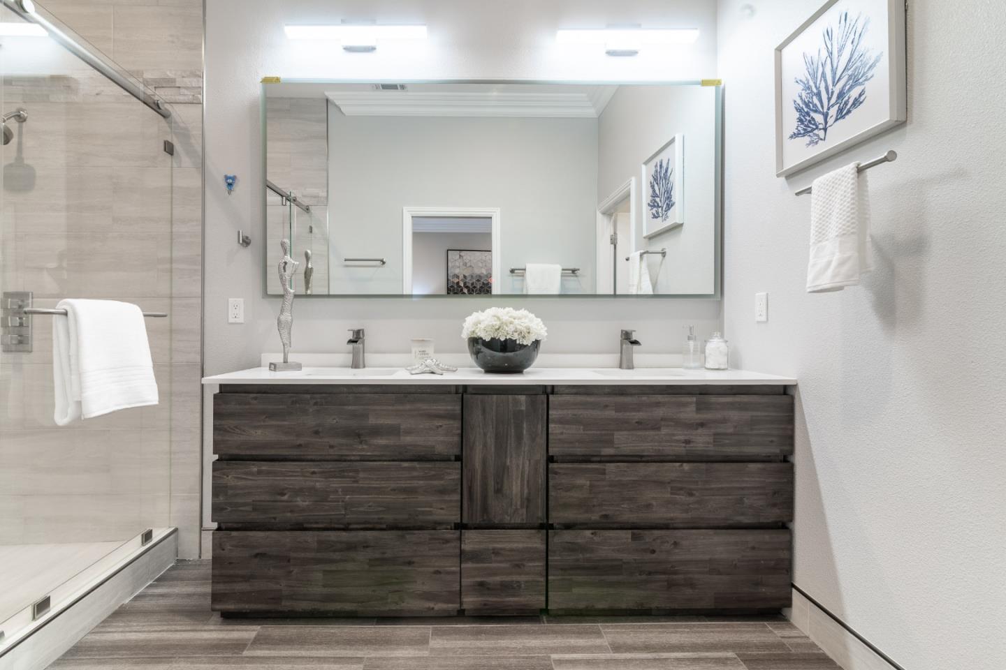 1258 South Stelling Road Cupertino, CA 95014 - Photo 51 of 56 a bathroom with a vanity vanity and a mirror