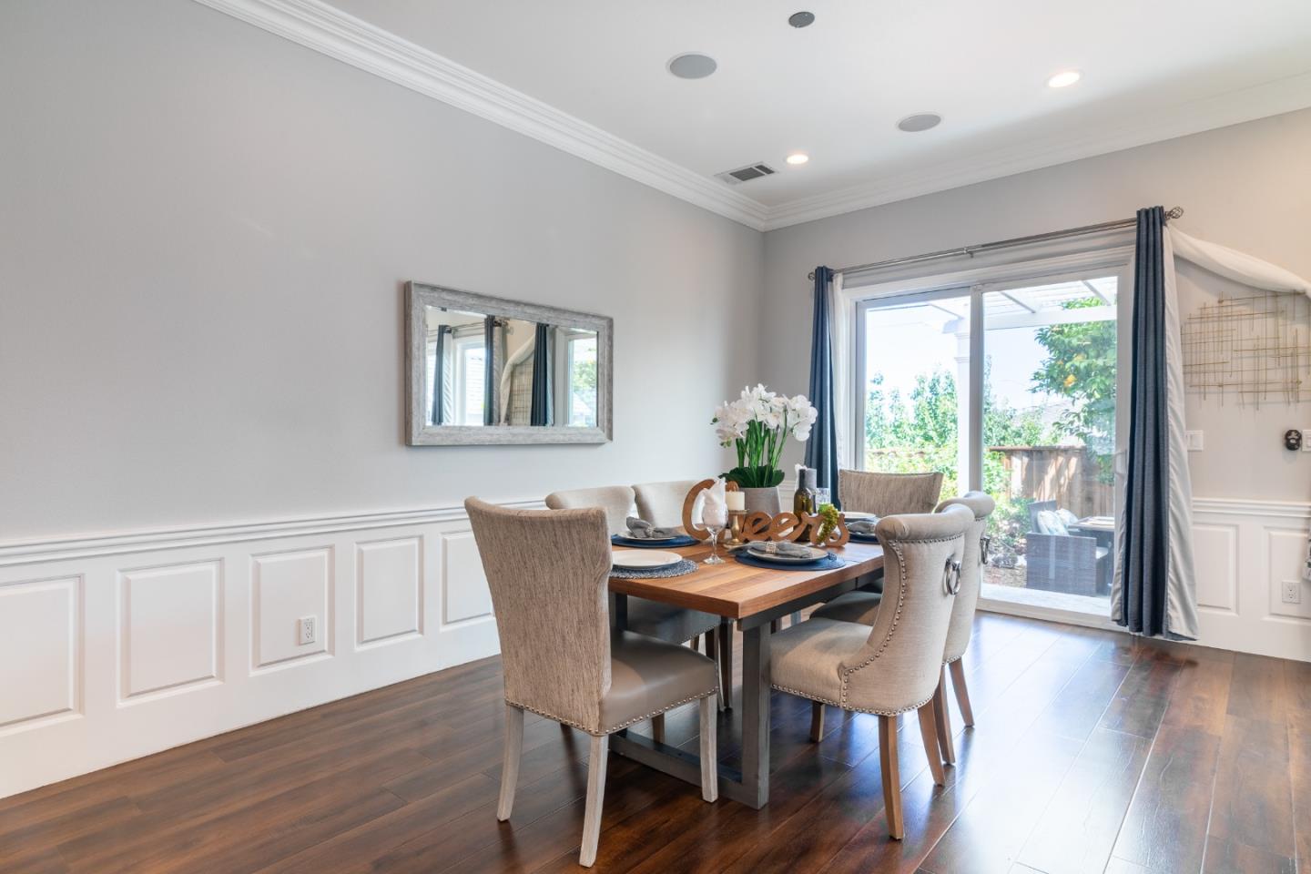 1258 South Stelling Road Cupertino, CA 95014 - Photo 6 of 56 a view of a dining room with furniture and wooden floor