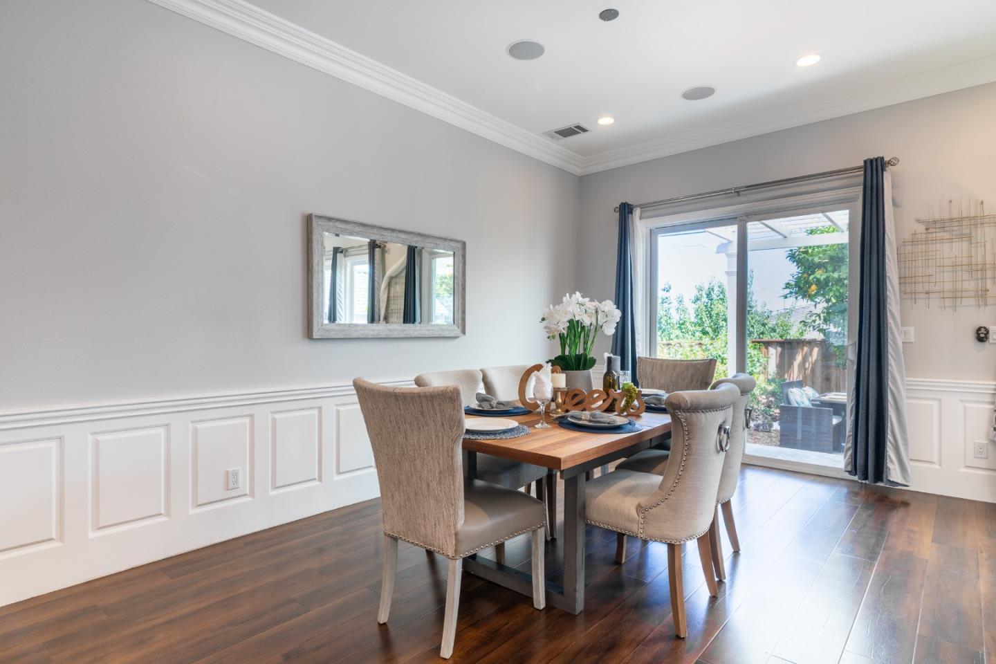1258 South Stelling Road Cupertino, CA 95014 - Photo 7 of 56 a view of a dining room with furniture and wooden floor