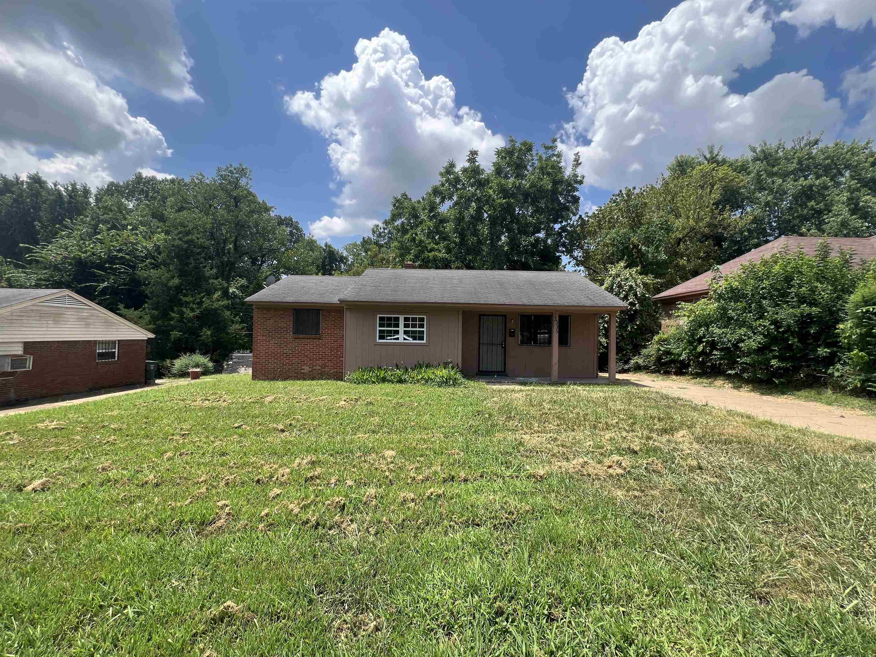 2235 Charjean Road Memphis, TN 38114 - Photo 14 of 15 a front view of a house with garden