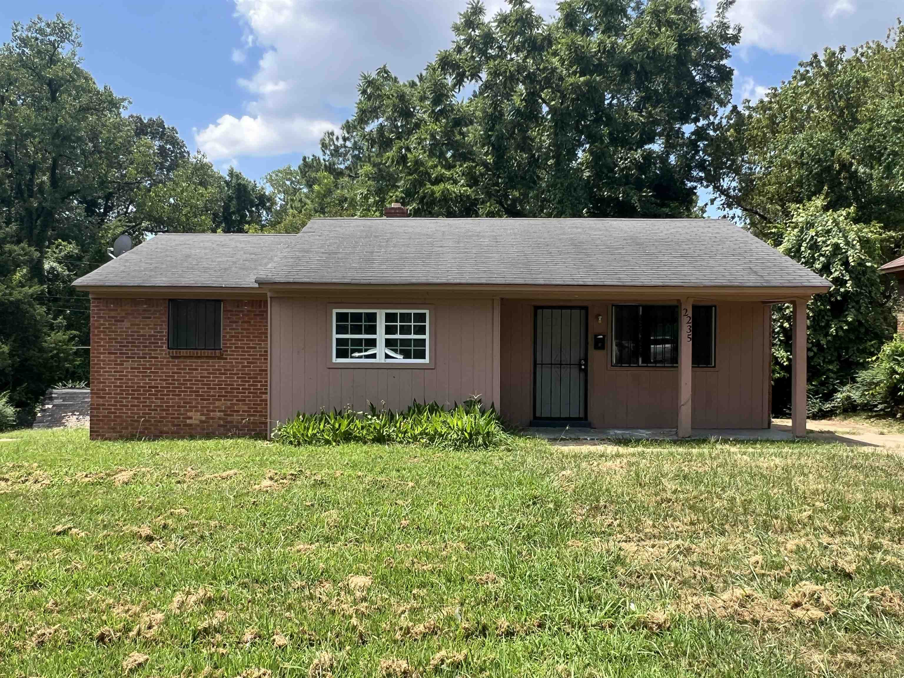 2235 Charjean Road Memphis, TN 38114 - Photo 2 of 15 a view of a house with a yard