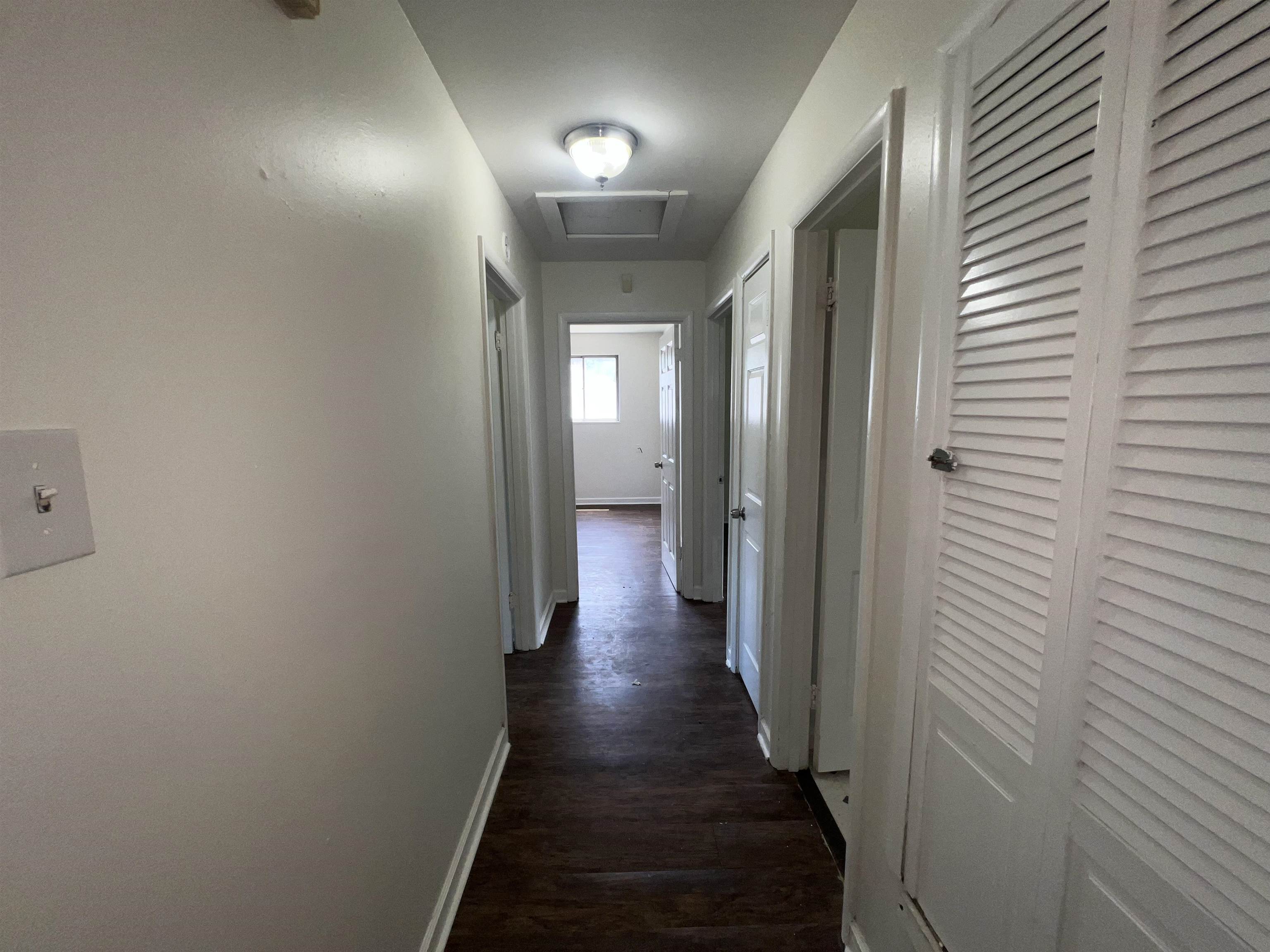 2235 Charjean Road Memphis, TN 38114 - Photo 9 of 15 a view of a hallway with wooden floor