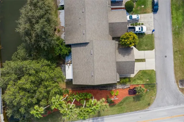 an aerial view of a house with a garden