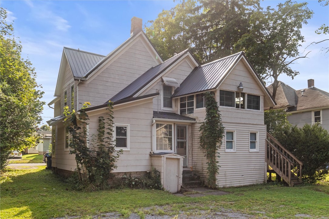 117 Madison Street Arcadia, NY 14513 - Photo 4 of 48 rear of first house