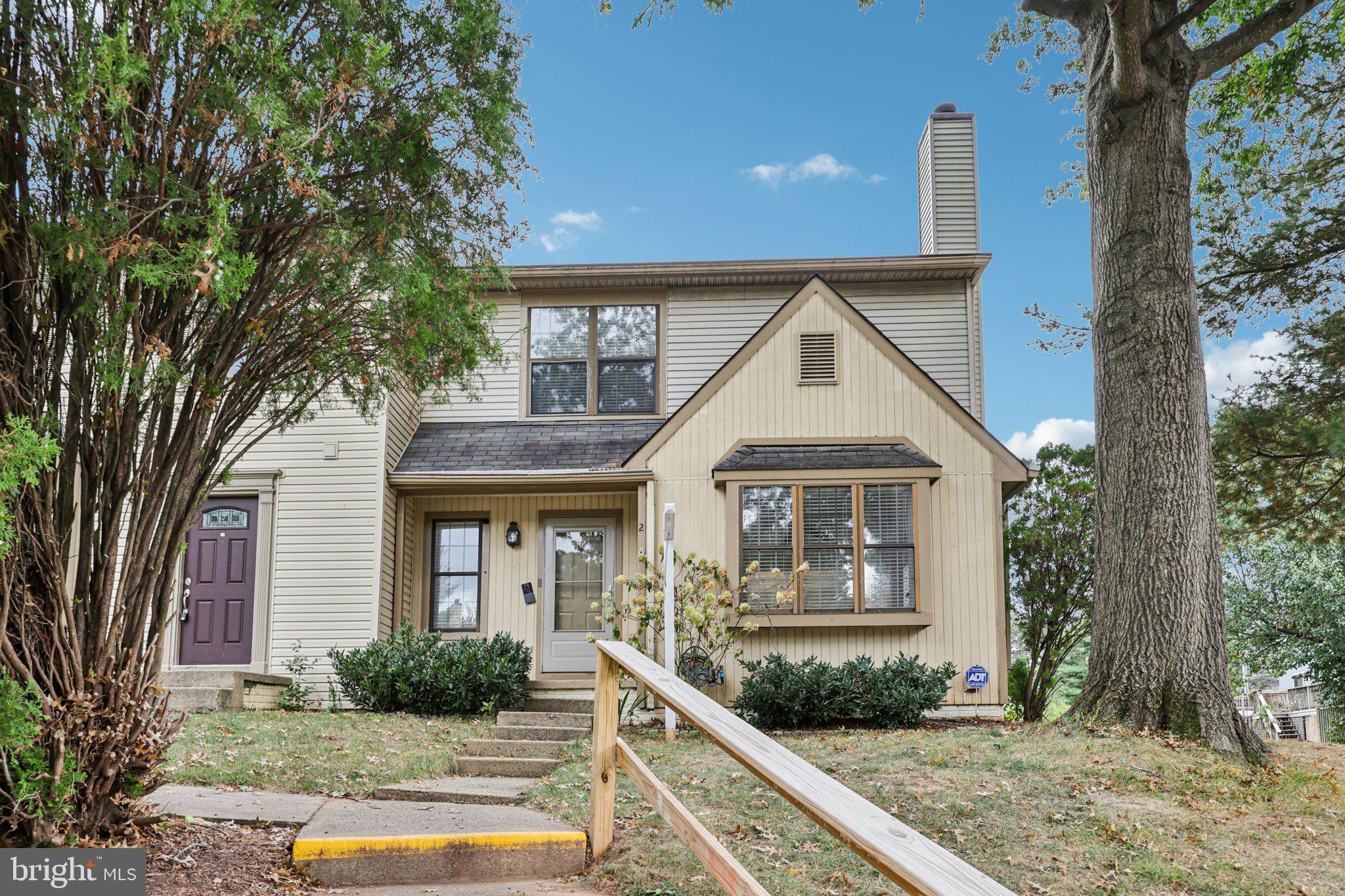 2 Berkeley Court Sterling, VA 20165 - Photo 1 of 46 a front view of a house with garden