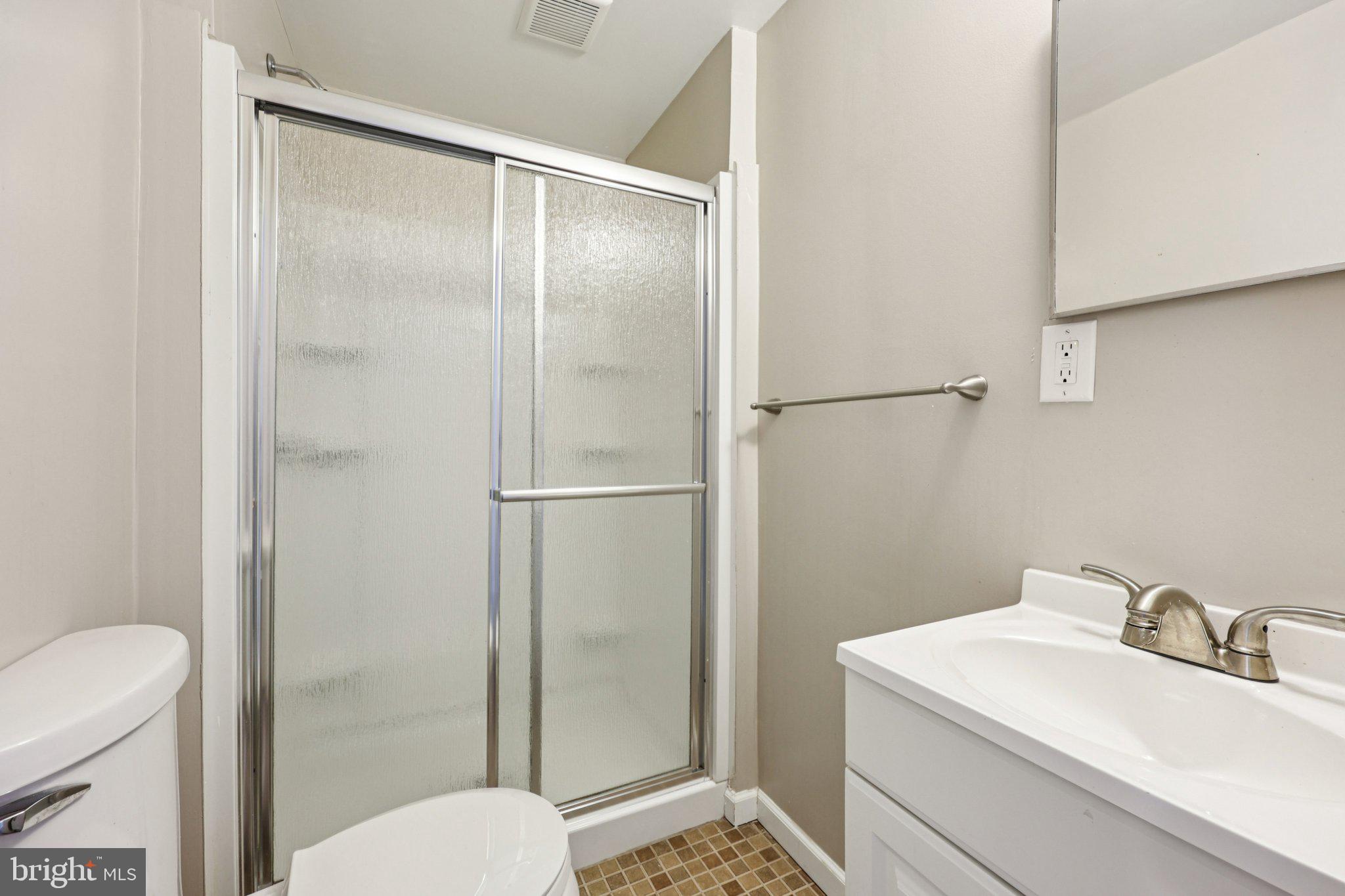 2 Berkeley Court Sterling, VA 20165 - Photo 32 of 46 a bathroom with a sink toilet and shower