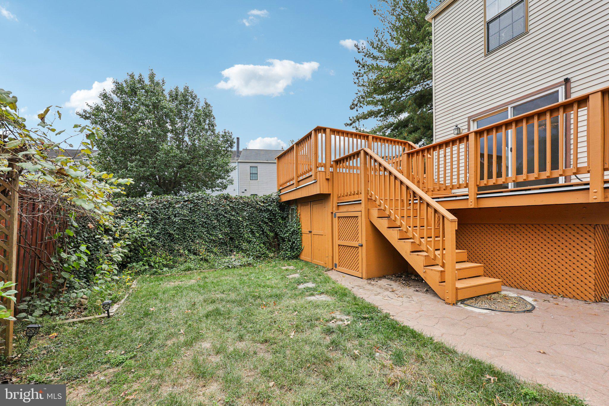 2 Berkeley Court Sterling, VA 20165 - Photo 42 of 46 a view of balcony with staircase and wooden fence
