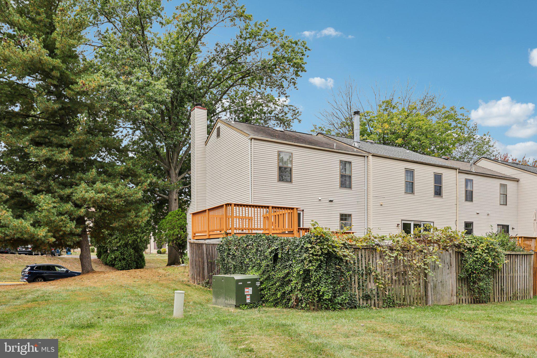 2 Berkeley Court Sterling, VA 20165 - Photo 44 of 46 a front view of a house with a yard