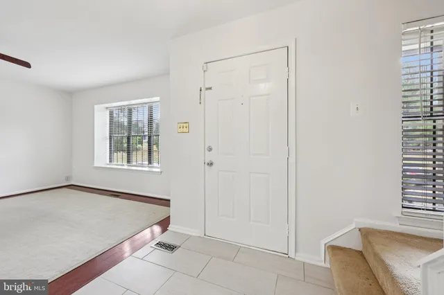 a view of an empty room and window