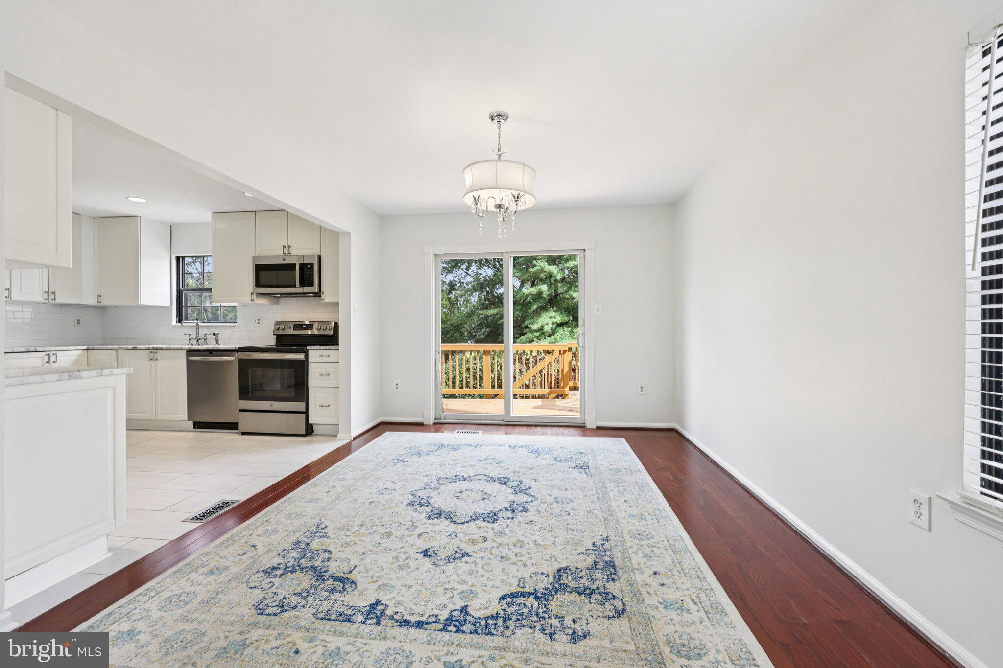 2 Berkeley Court Sterling, VA 20165 - Photo 9 of 46 a view of a kitchen with a sink and a window