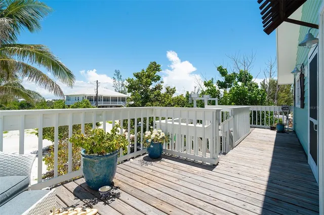 a view of balcony with furniture