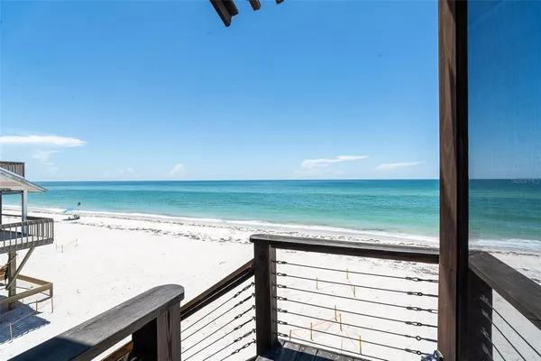 a view of a ocean from a balcony