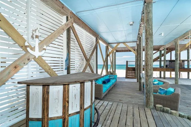 a view of balcony with wooden floor