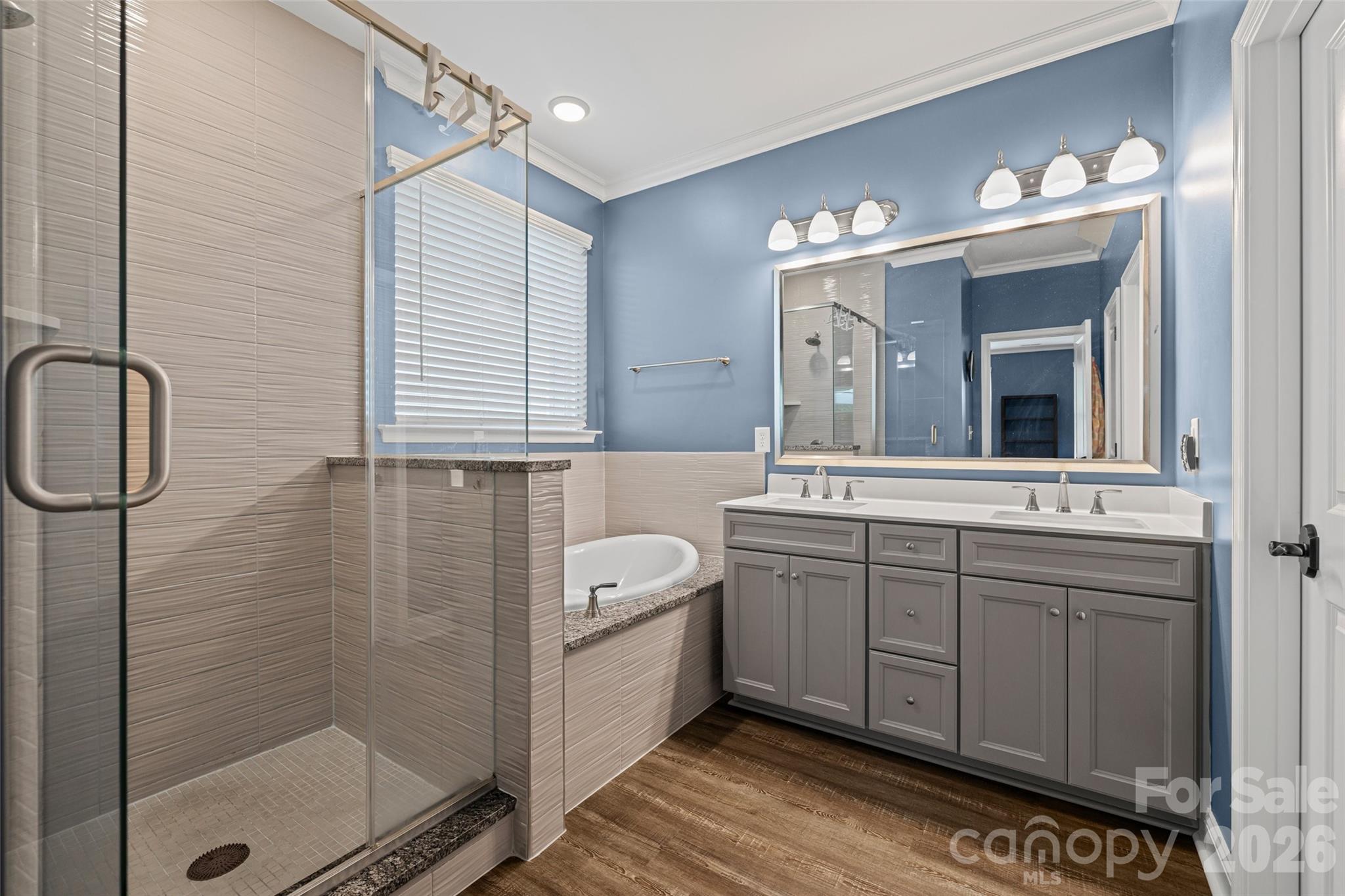 1321 Fishing Creek Road Clover, SC 29710 - Photo 26 of 47 a bathroom with a double vanity sink mirror and bathtub