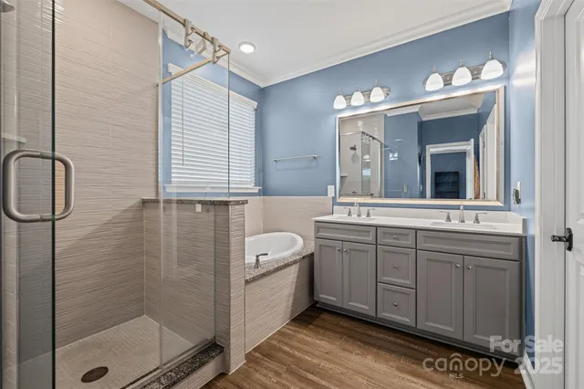 a view of a swimming pool and lounge chairs