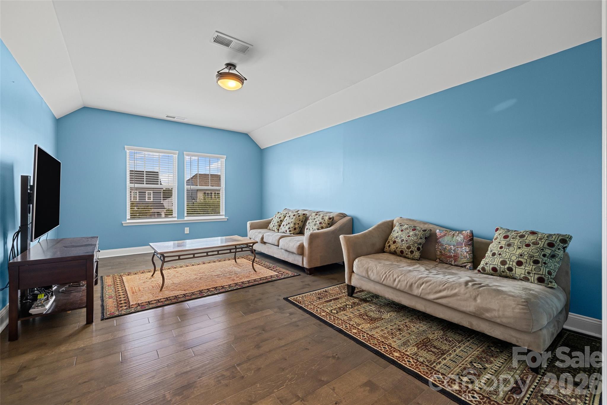 1321 Fishing Creek Road Clover, SC 29710 - Photo 32 of 47 a living room with furniture and a flat screen tv