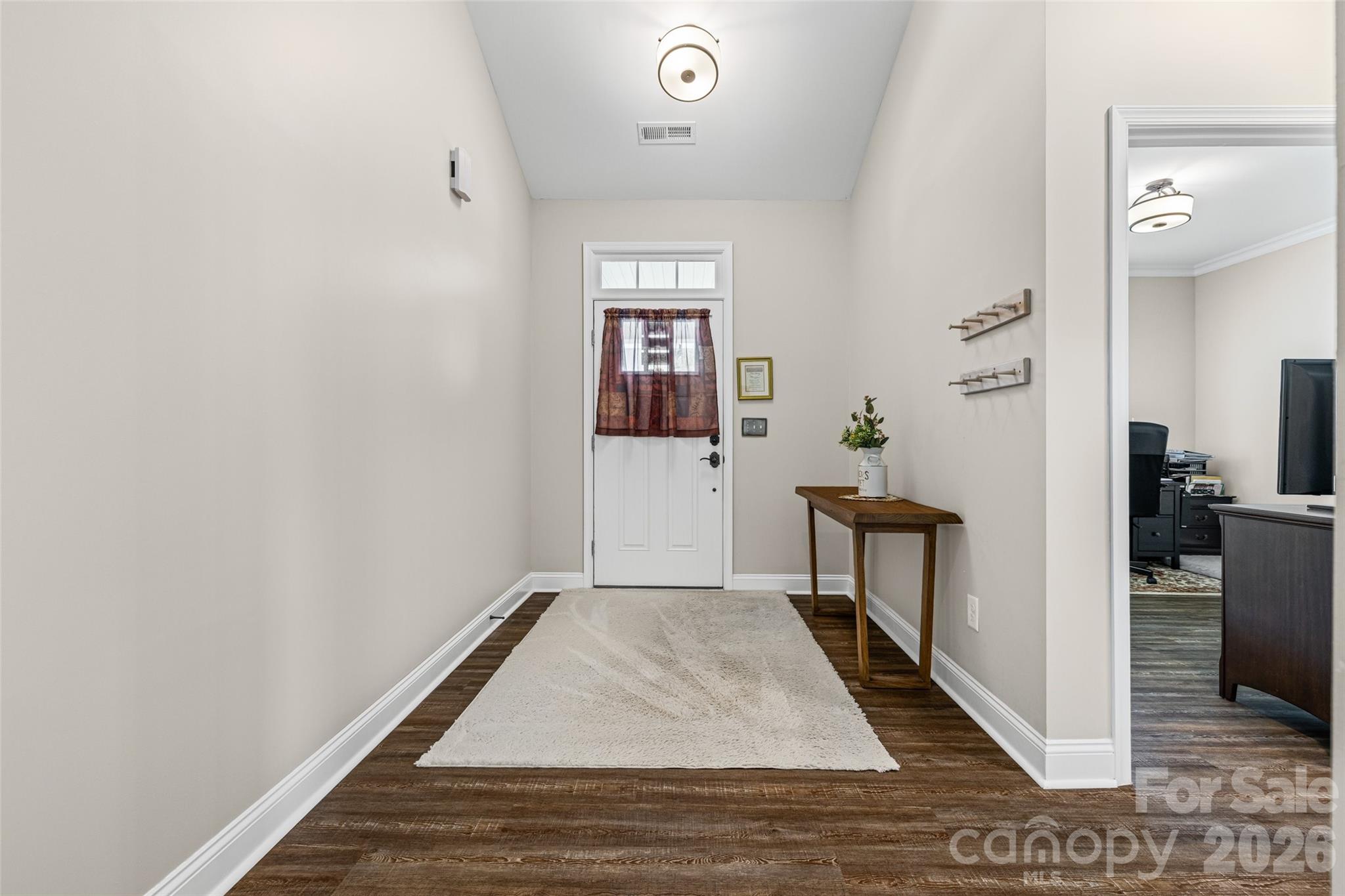 1321 Fishing Creek Road Clover, SC 29710 - Photo 6 of 47 a view of a hallway to a livingroom with furniture