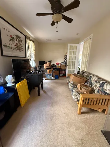 a view of balcony with furniture