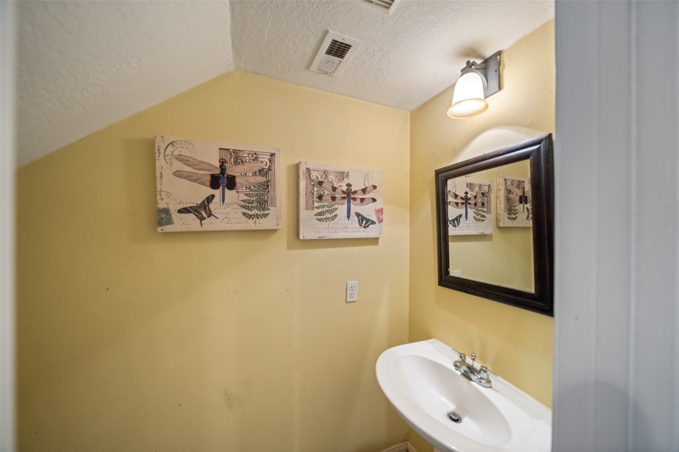 2514 Raintree Village Drive Katy, TX 77449 - Photo 12 of 26 a bathroom with a toilet and a sink