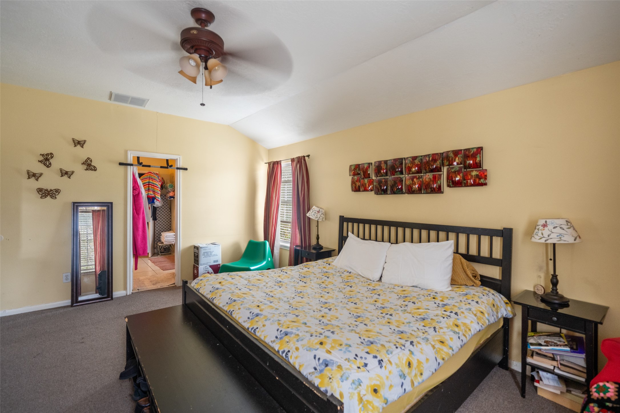 2514 Raintree Village Drive Katy, TX 77449 - Photo 16 of 26 a bedroom with a bed a dresser and book shelf