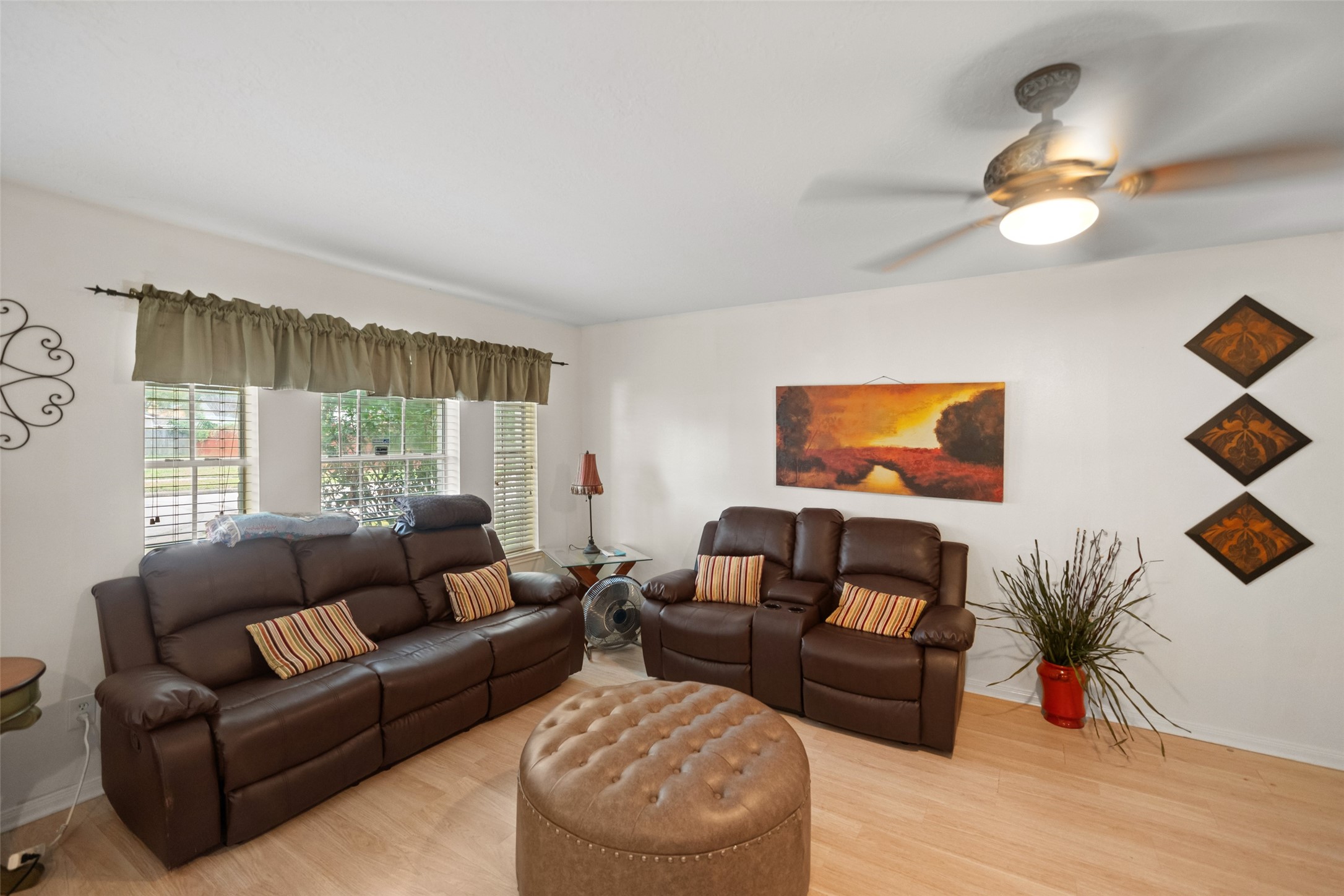 2514 Raintree Village Drive Katy, TX 77449 - Photo 4 of 26 a living room with furniture and a large window