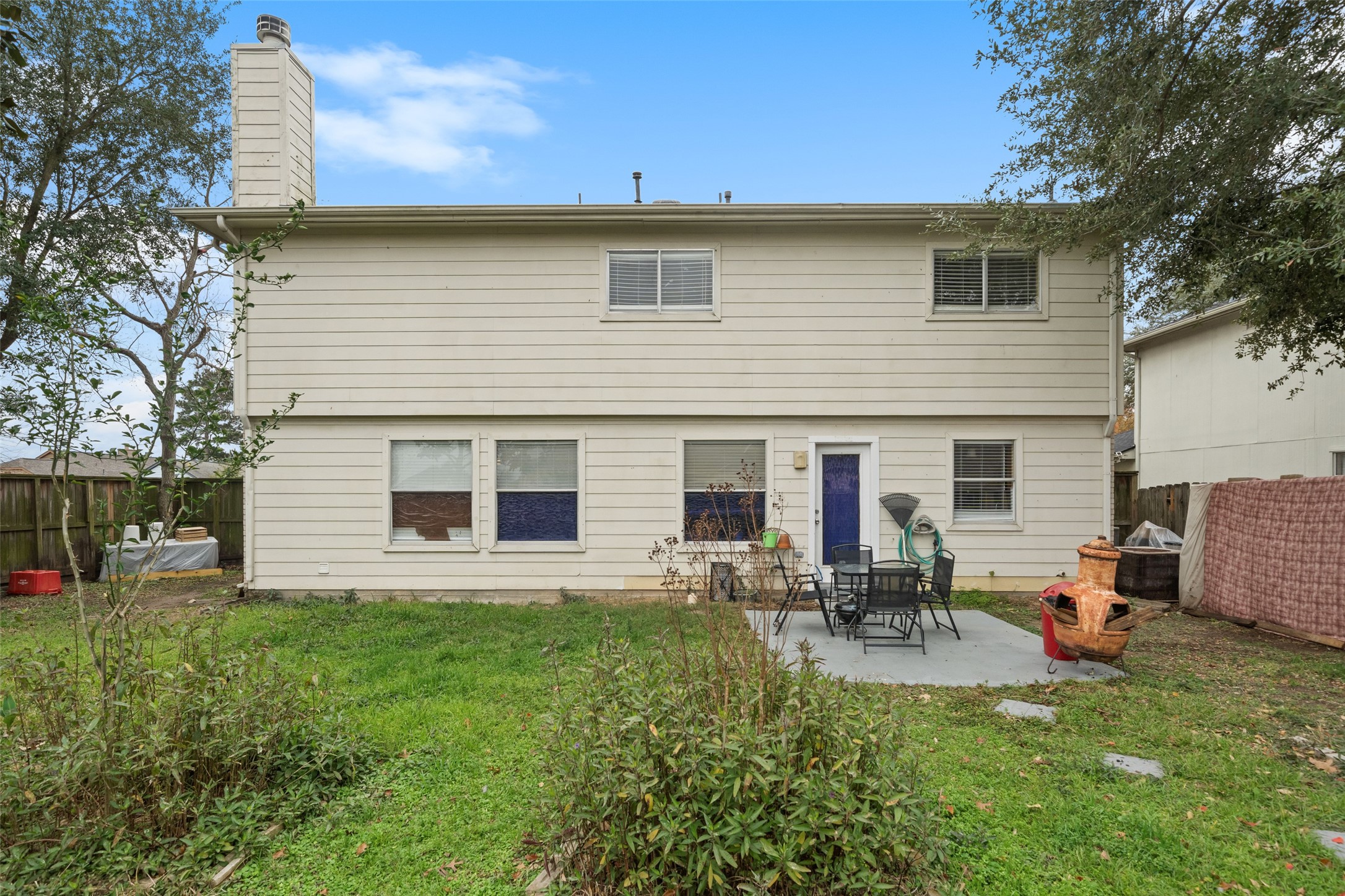 2514 Raintree Village Drive Katy, TX 77449 - Photo 6 of 26 a house view with a sitting space and garden