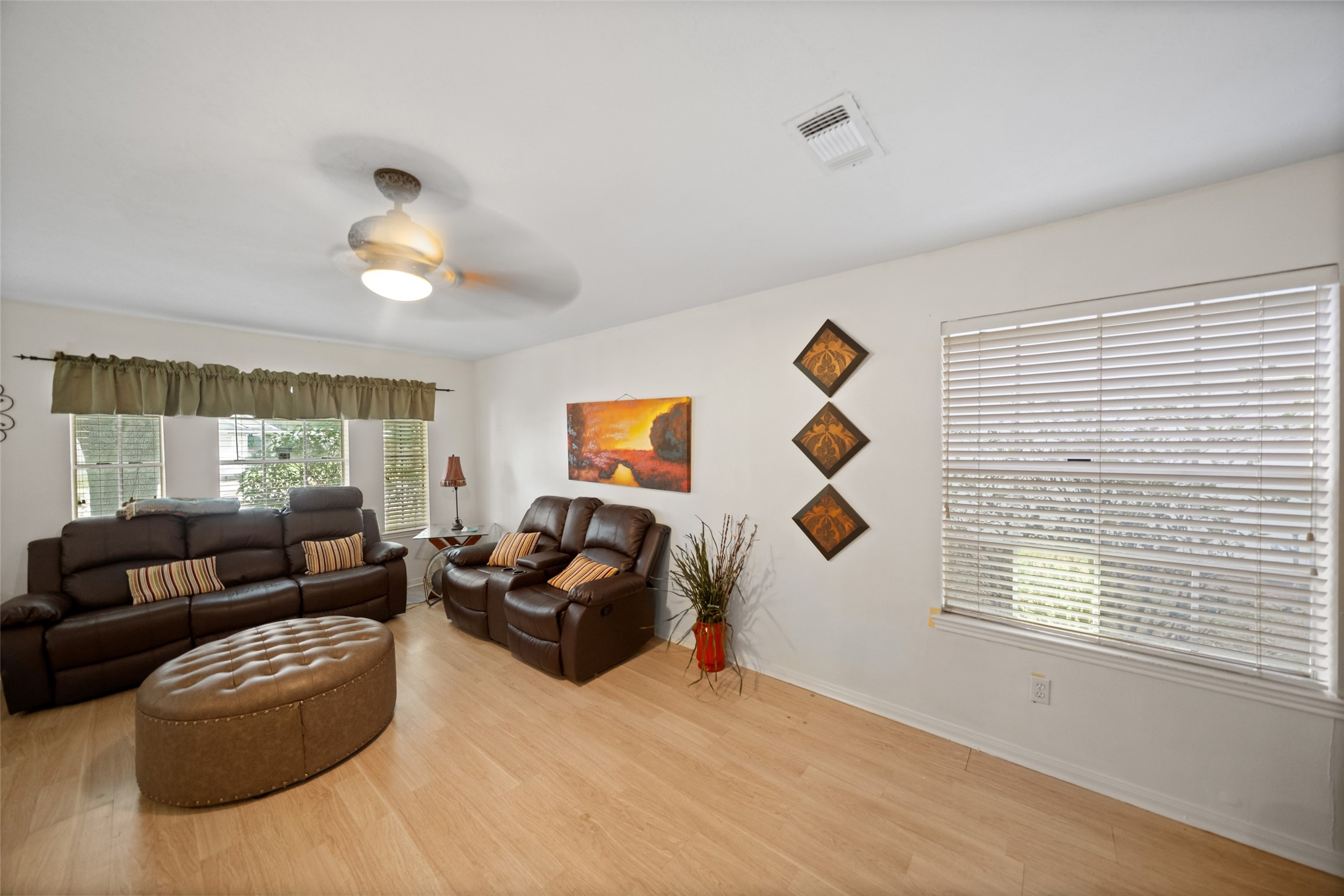 2514 Raintree Village Drive Katy, TX 77449 - Photo 8 of 26 a living room with furniture and a window