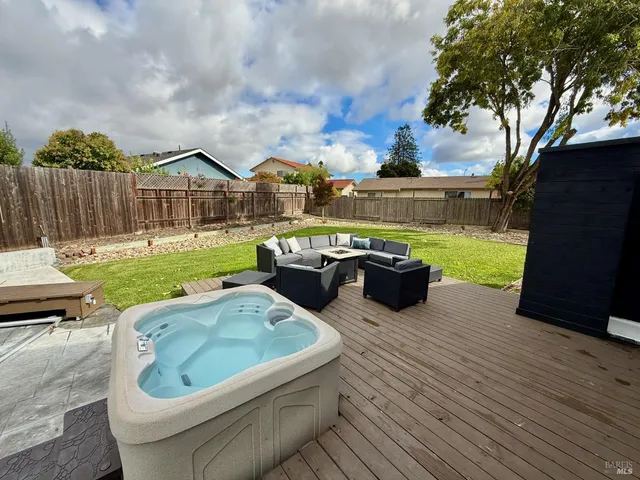 a view of a garden with patio