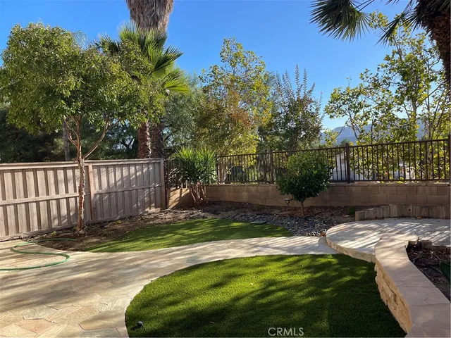 a view of a backyard with a small cabin