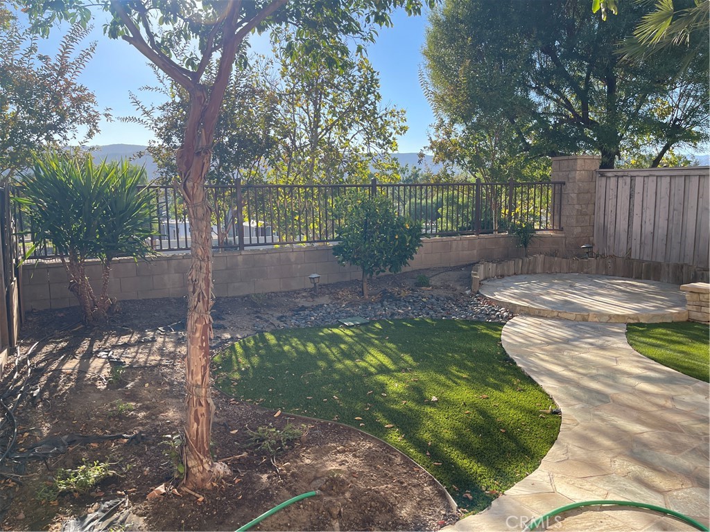 25248 Meadow Walk Street, Unit 1 Murrieta, CA 92562 - Photo 18 of 18 a view of a backyard