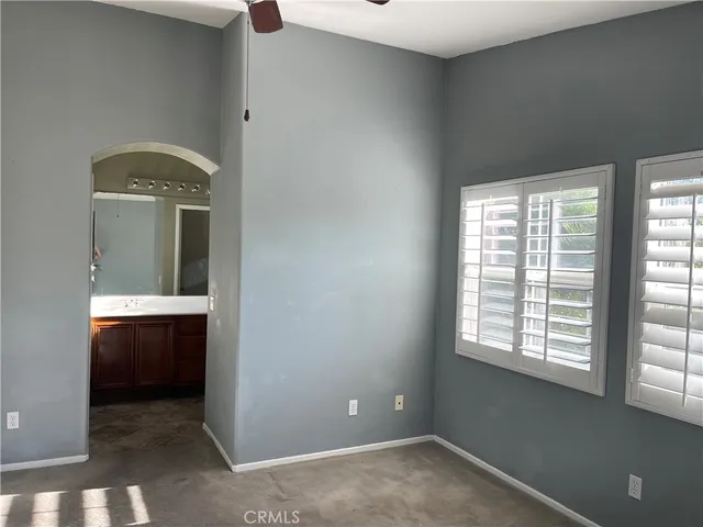 an empty room that has a window