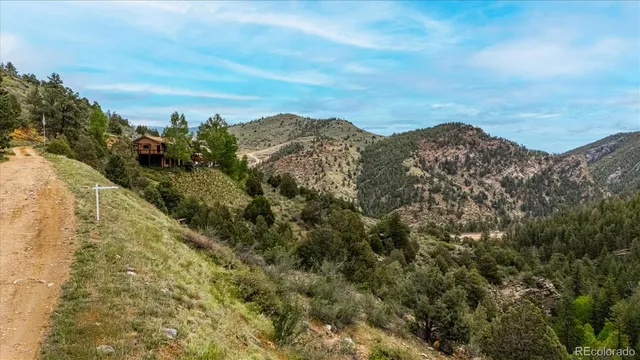 a view of a lake with mountains in the background