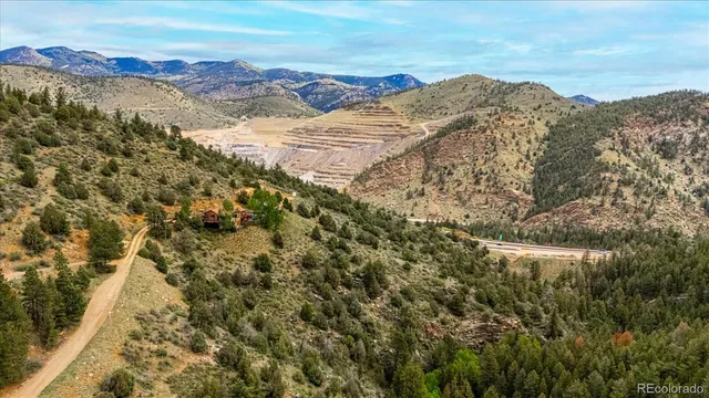 a view of mountain view with mountains in the background