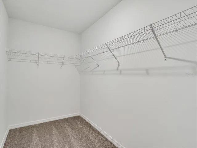 a view of a room with racks on the wall