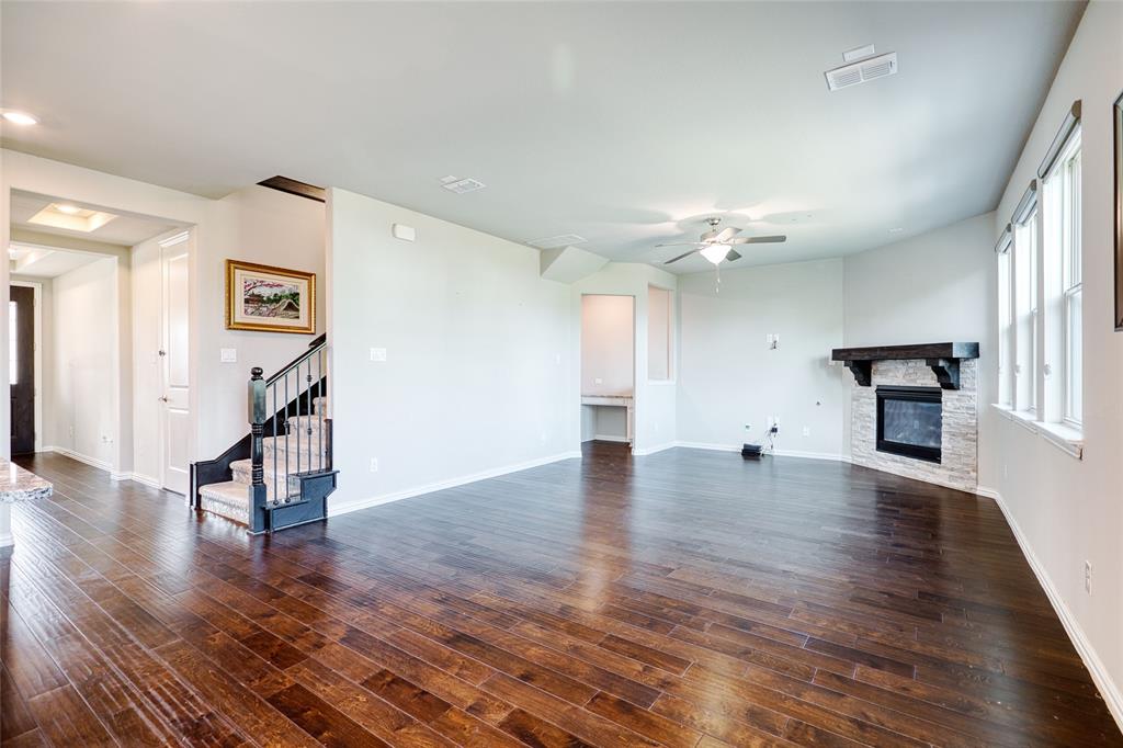 2317 Connor Way Carrollton, TX 75010 - Photo 12 of 37 a view of empty room with wooden floor